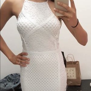 Short white lace dress in excellent condition.